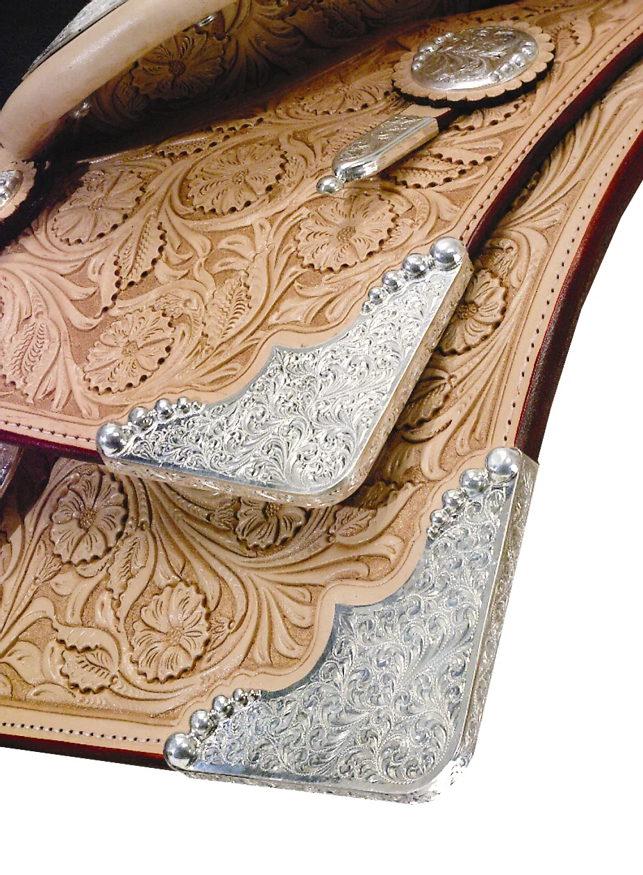 Reno square wrapped edge rear skirt plates for custom western saddle designs.