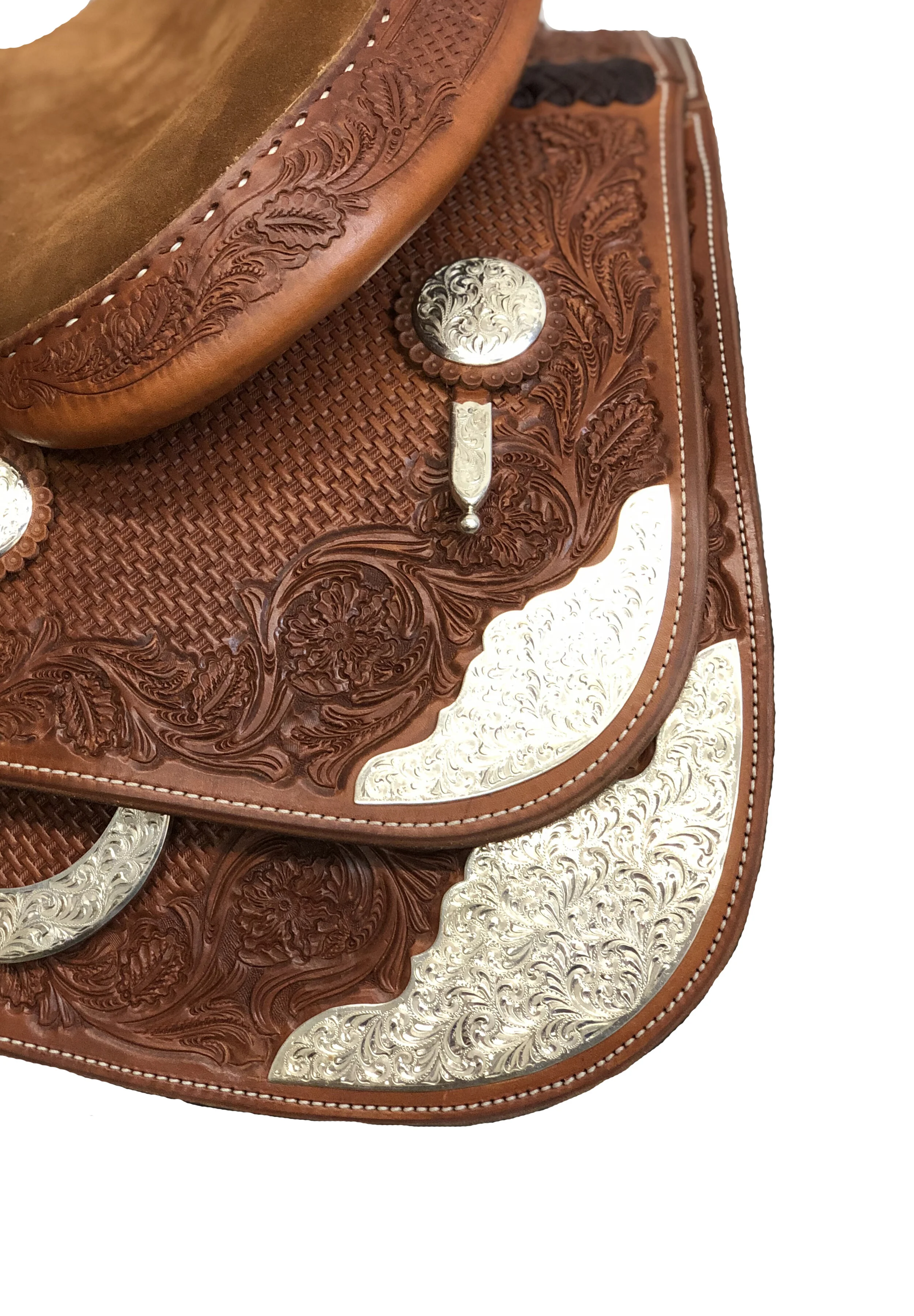 Arizona rear skirt corner and housing plates crafted for custom western saddles.