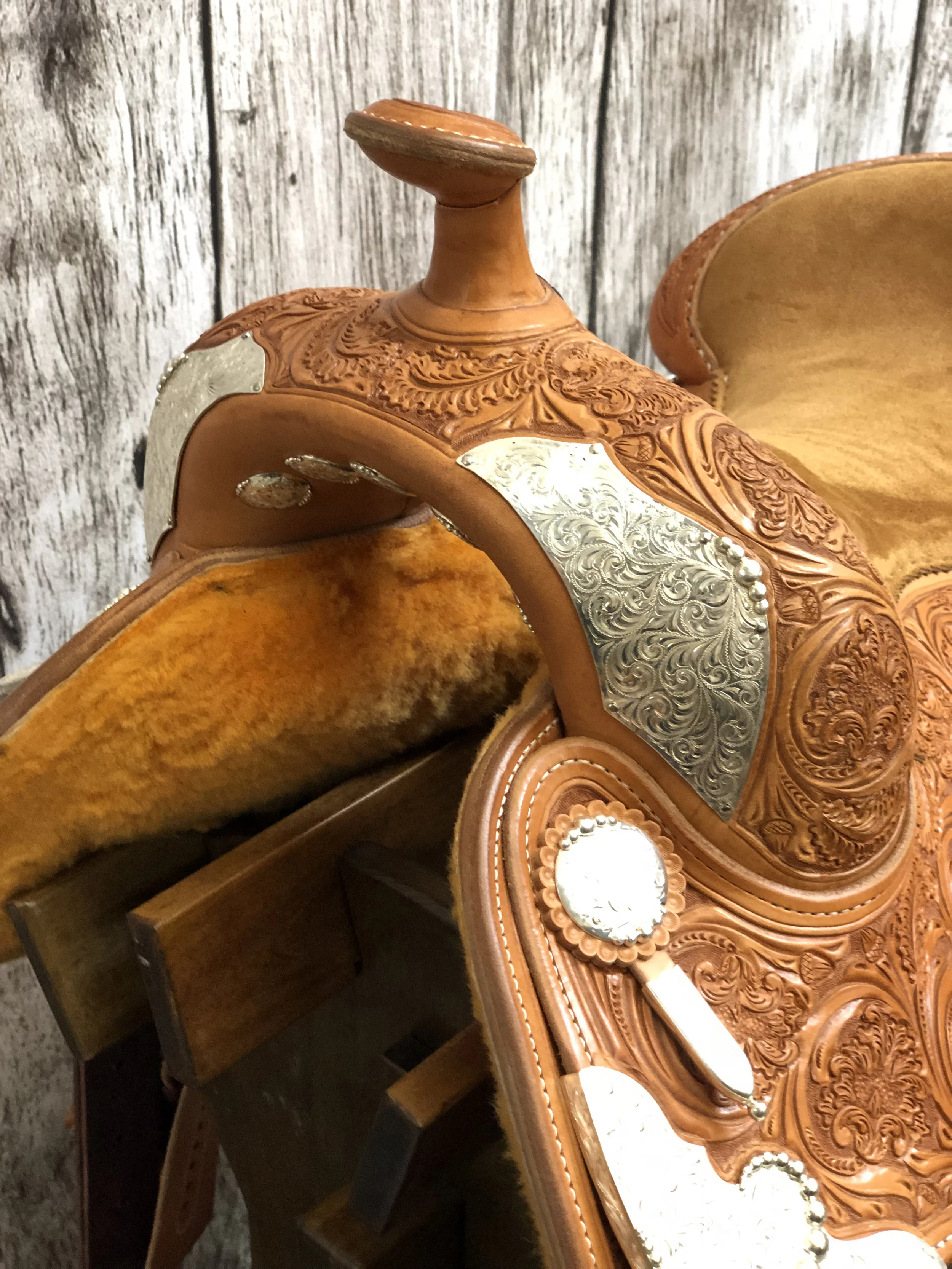 Front DH plates with silver overlay and teardrops for custom western saddles.