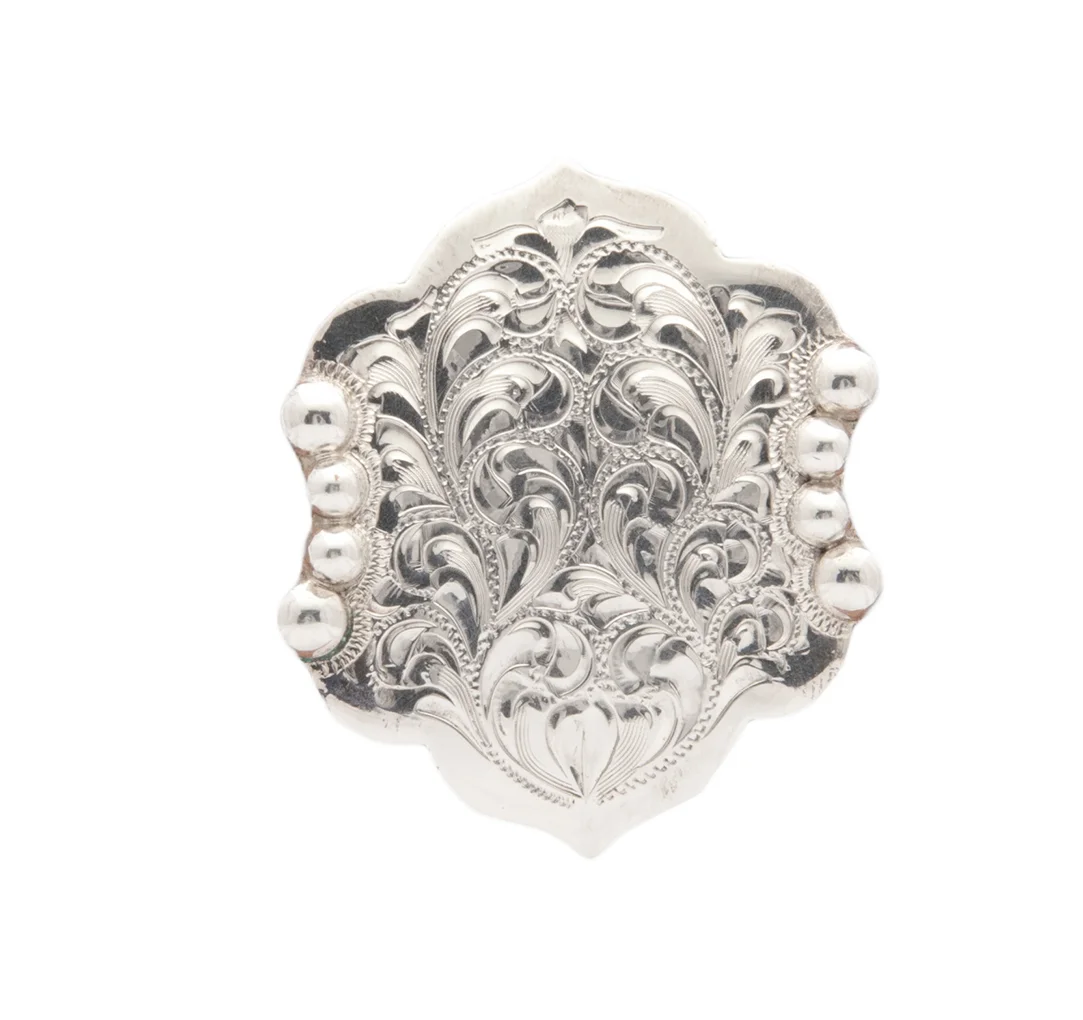 High Desert silver concho featuring classic western styling for leather accessories.