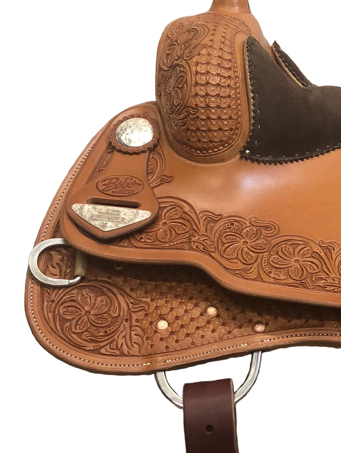 In-skirt rigging system for ranch and performance western saddles with reduced bulk.