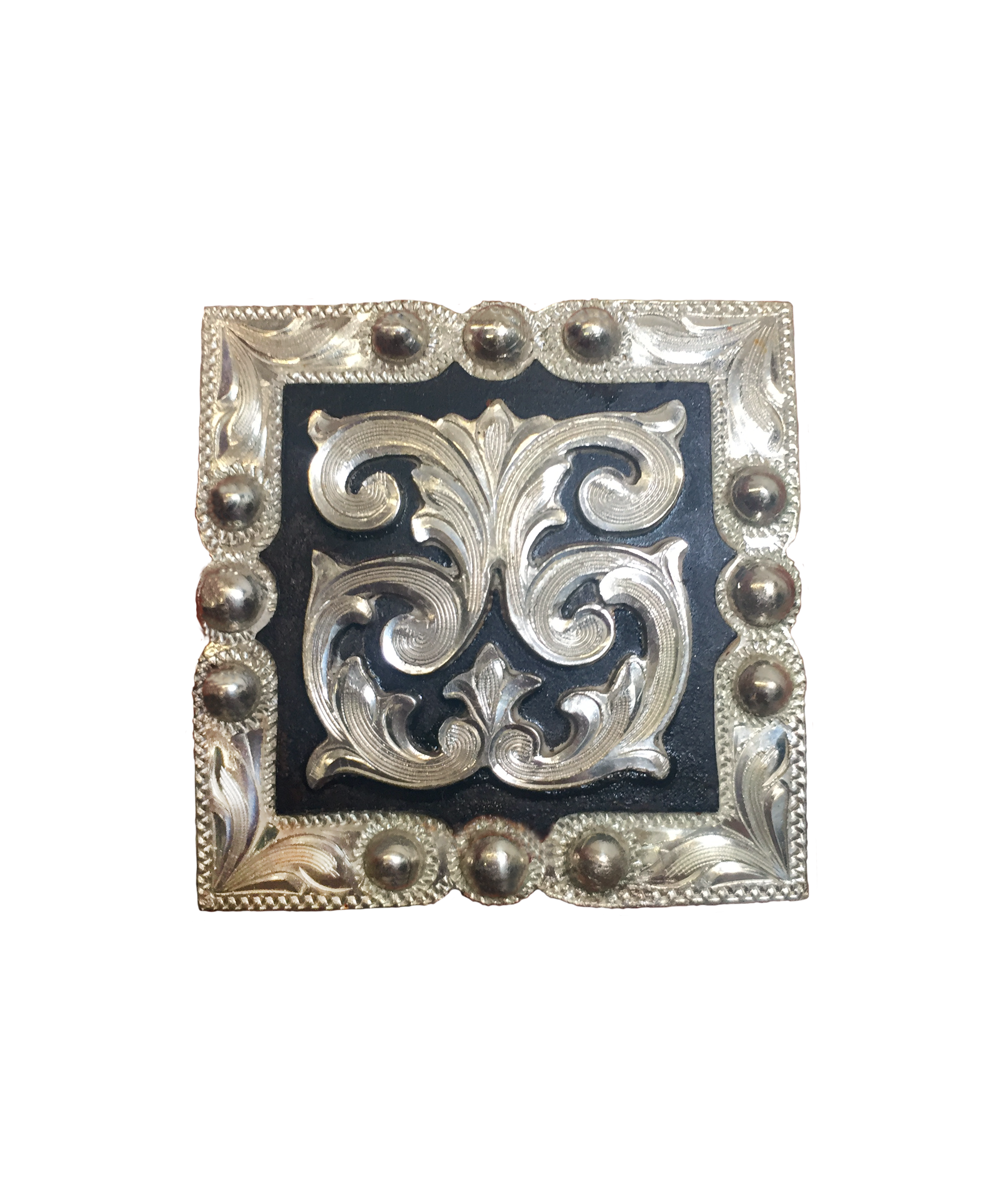 Pinnacle Peak square concho with rust iron and silver overlay for custom western saddles.
