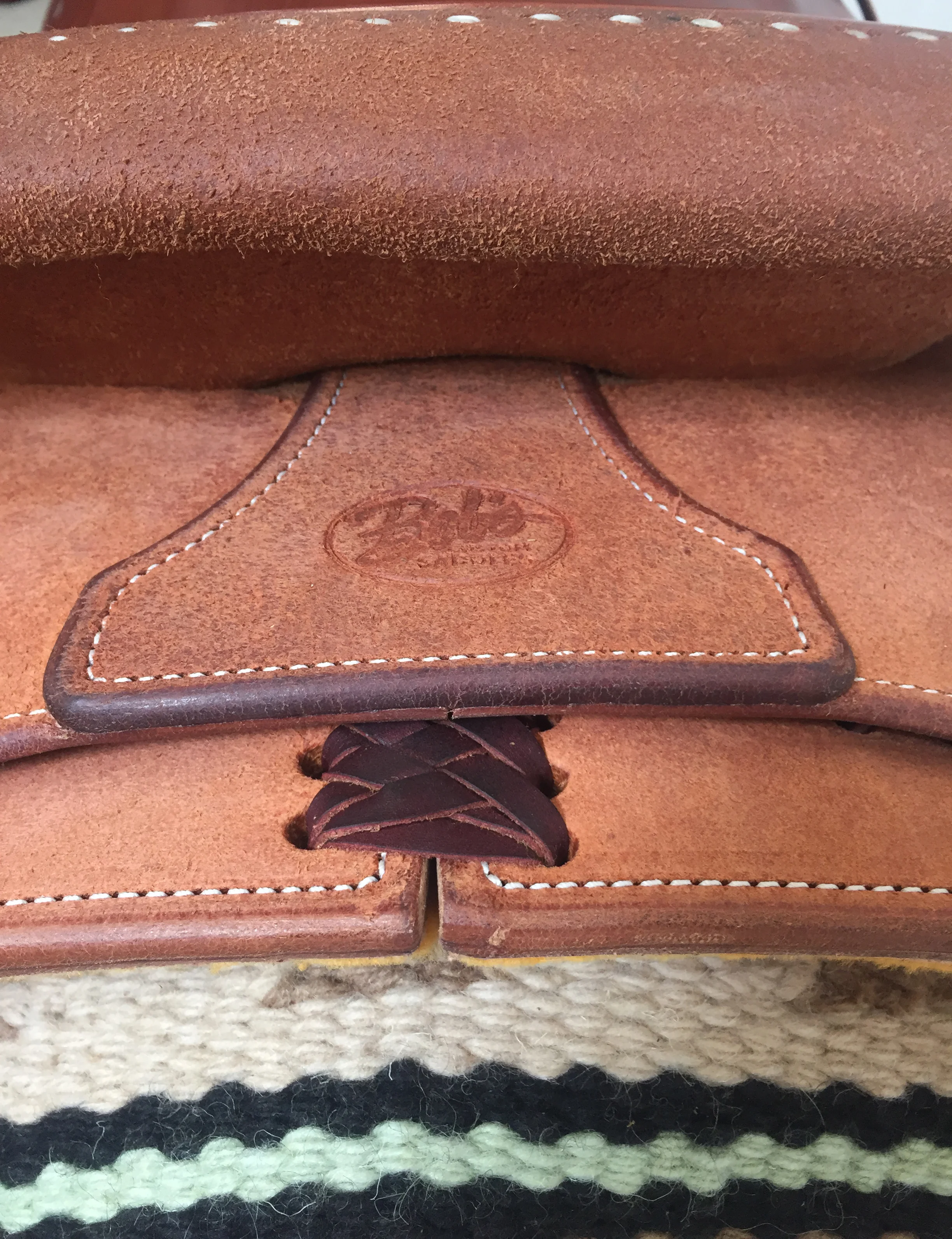 Plaque style housing upgrade designed for custom western saddle hardware.