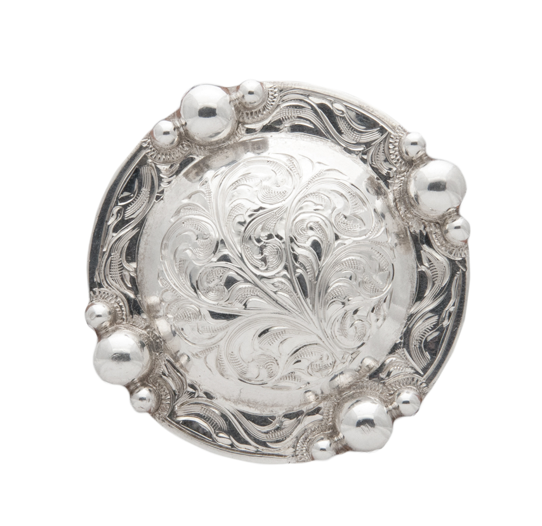 Rio Grande silver concho featuring authentic western craftsmanship and elegant detailing.