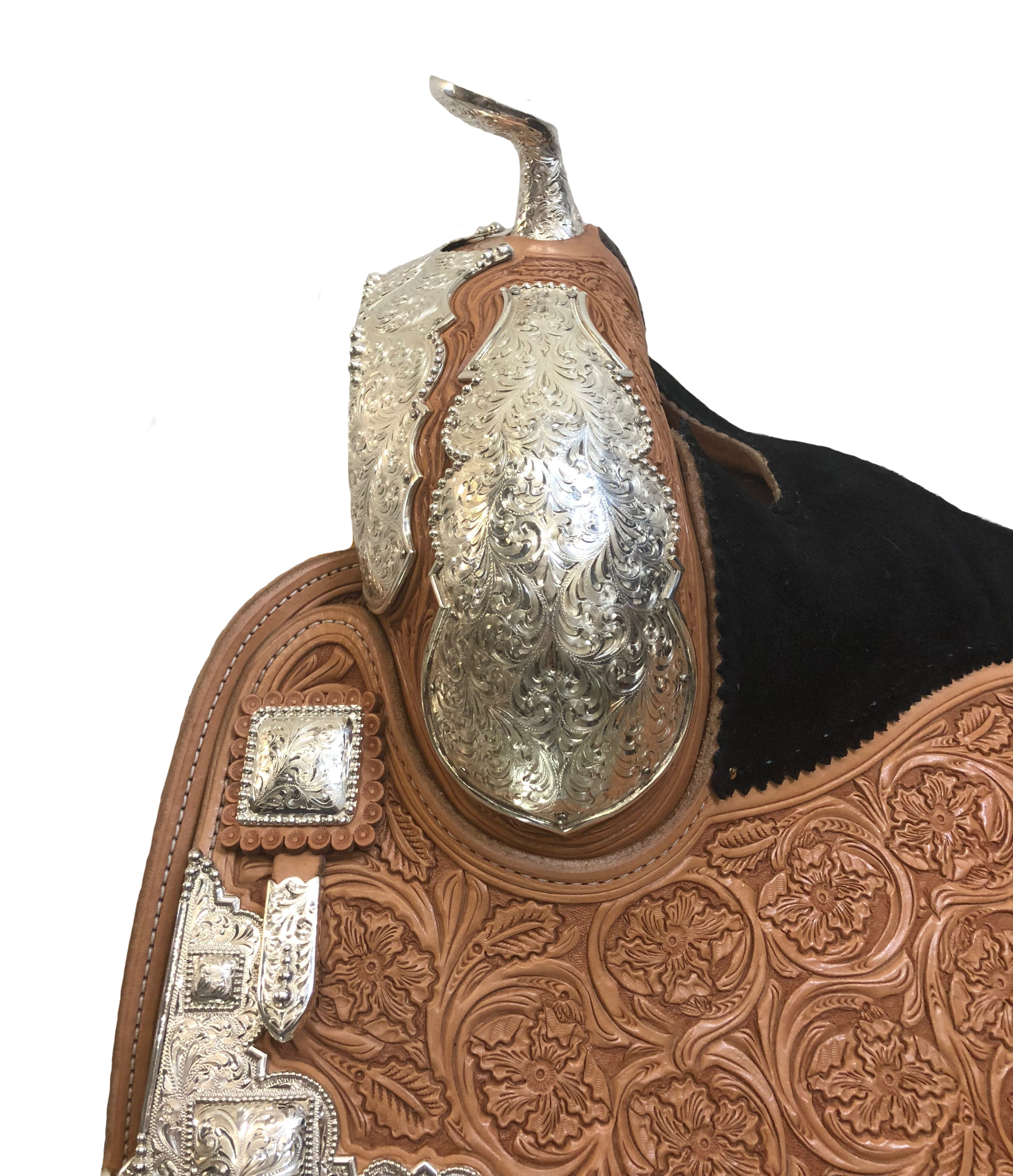 Silver saddle horn with custom engraving for premium western saddle customization.