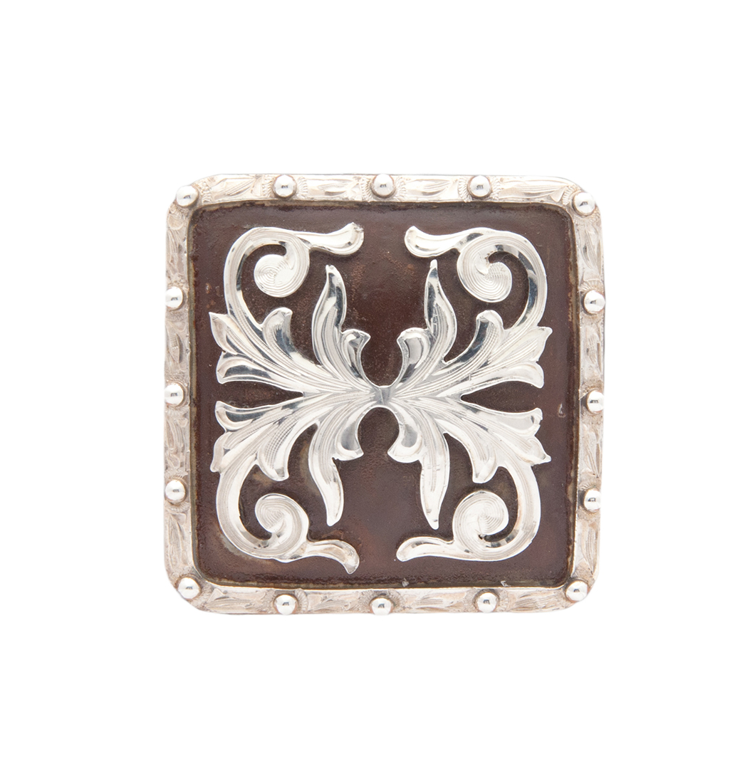 Sonora rust iron and silver concho crafted for premium western saddles and tack.