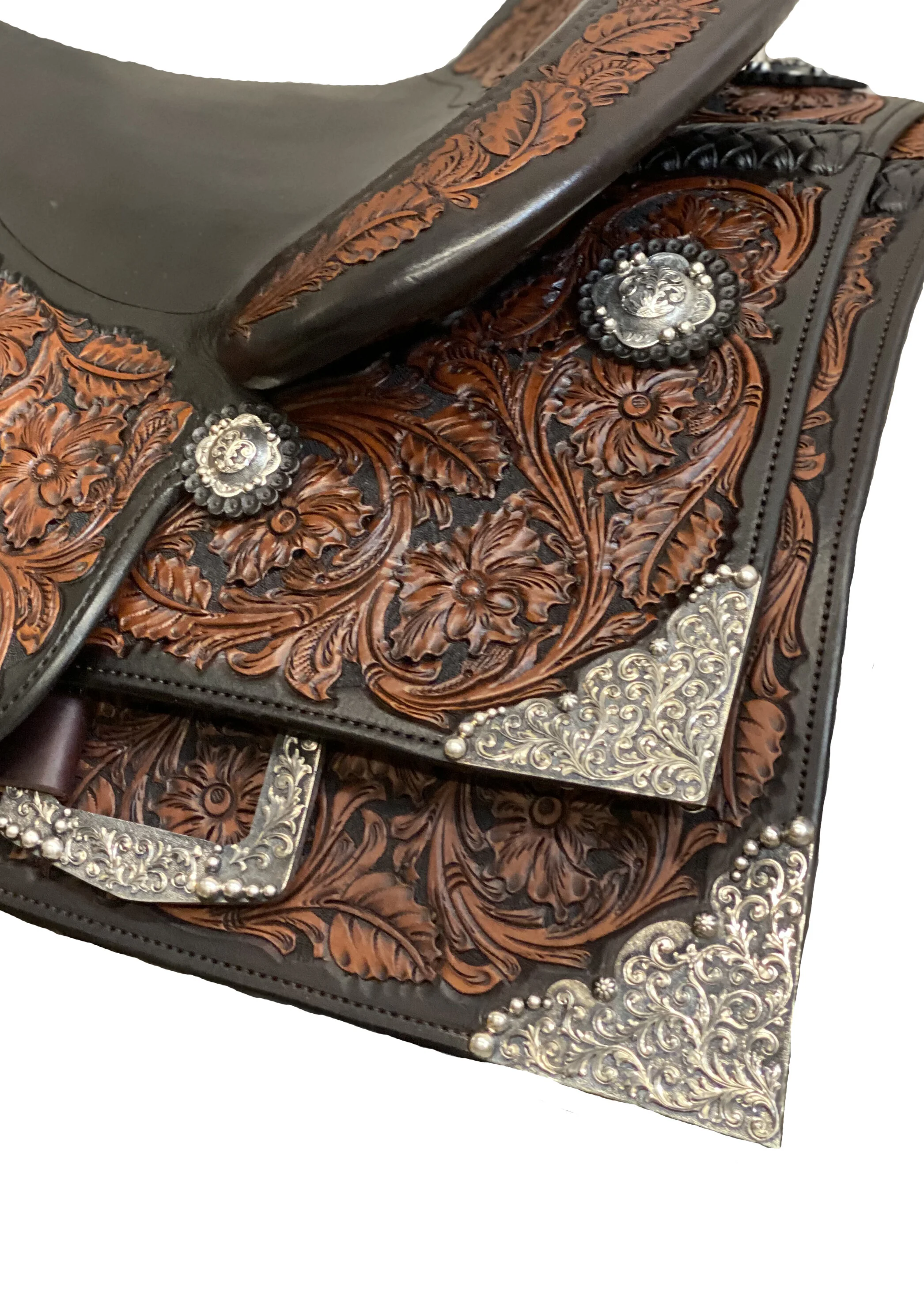 Tombstone oxidized silver overlay corner plates crafted for custom western saddles.