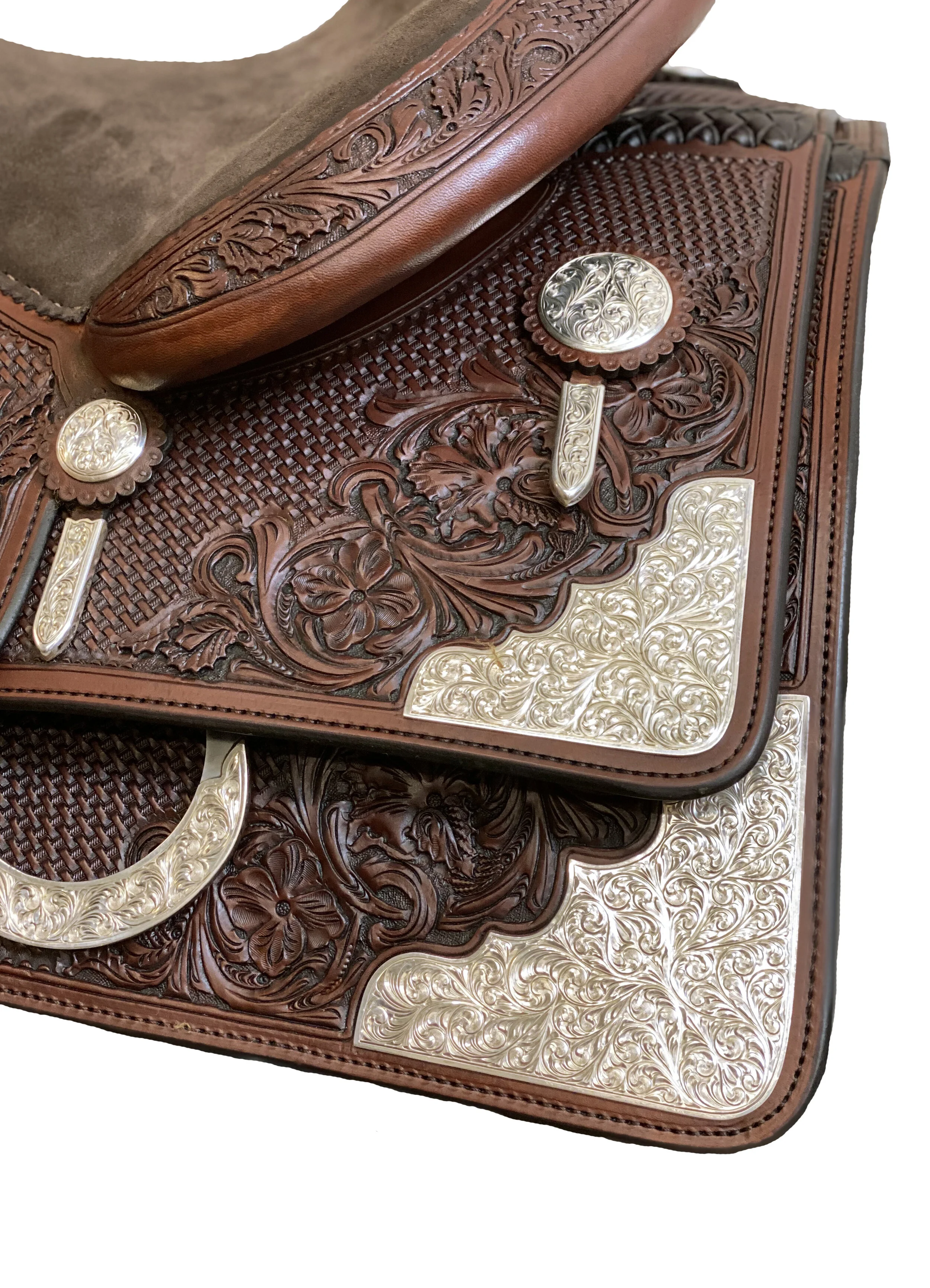 Wichita saddle rear skirt corners and housing plates for premium western saddles.